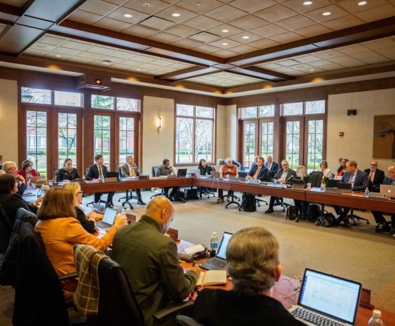 a meeting in the regents board room